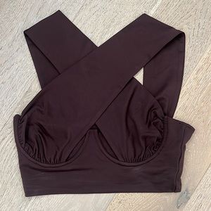 brown crop top with crossing straps and underwire cups